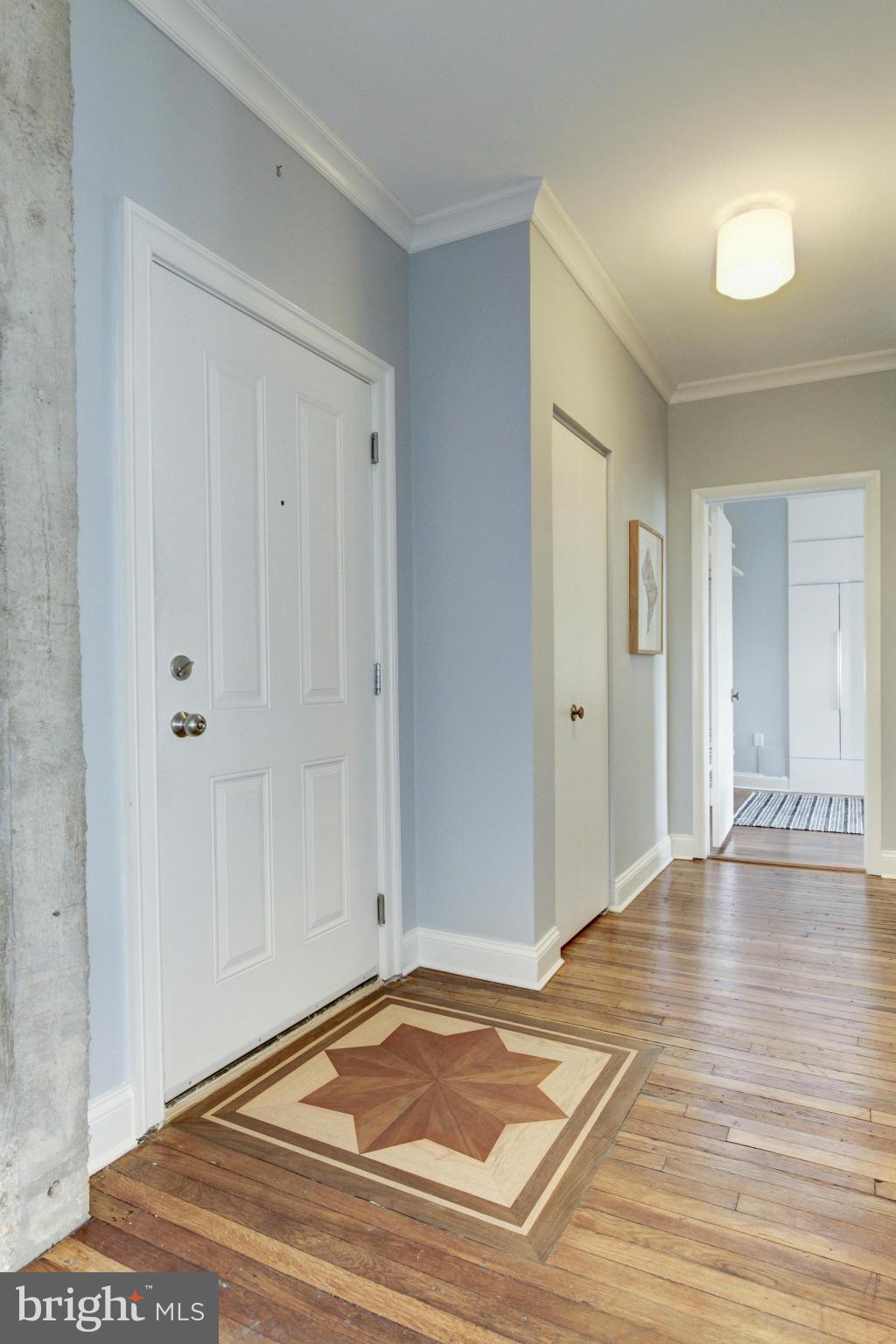 1701 16th Street Northwest, Unit 802 Washington, DC 20009 - Photo 2 of 11 a view of a livingroom with wooden floor