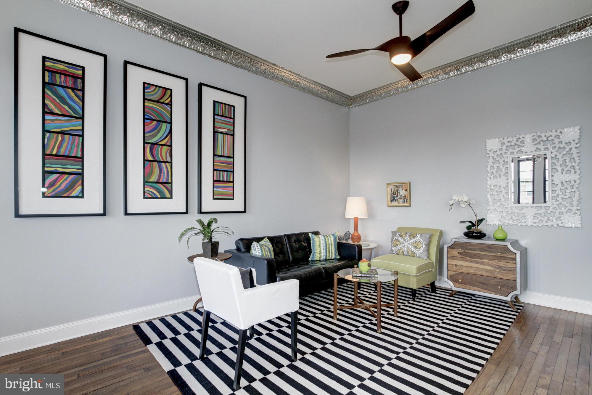 1701 16th Street Northwest, Unit 802 Washington, DC 20009 - Photo 3 of 11 a living room with furniture