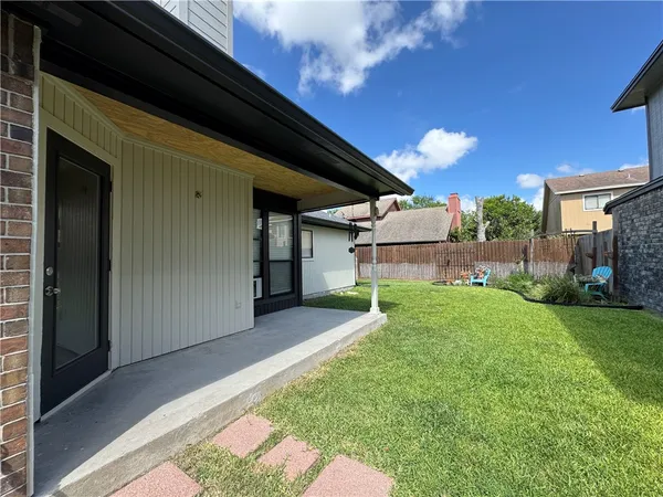 a view of a backyard with a garden