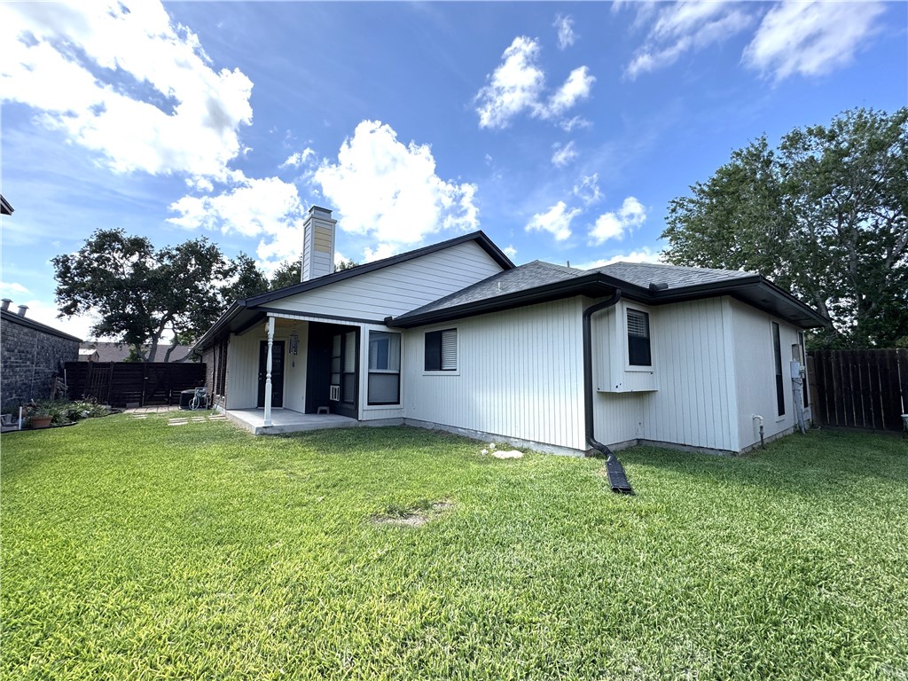6929 Monarch Street Corpus Christi, TX 78413 - Photo 16 of 16 a view of a house with a yard