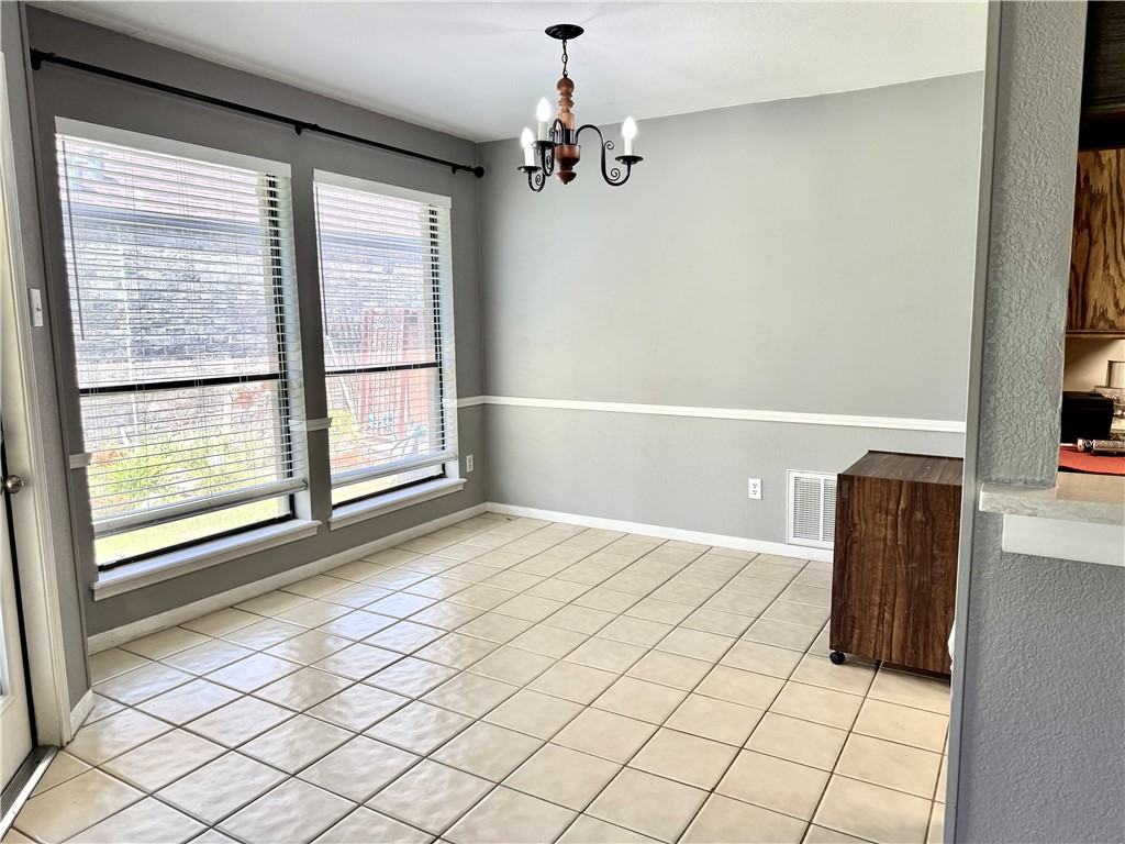 6929 Monarch Street Corpus Christi, TX 78413 - Photo 4 of 16 a view of an empty room with a window
