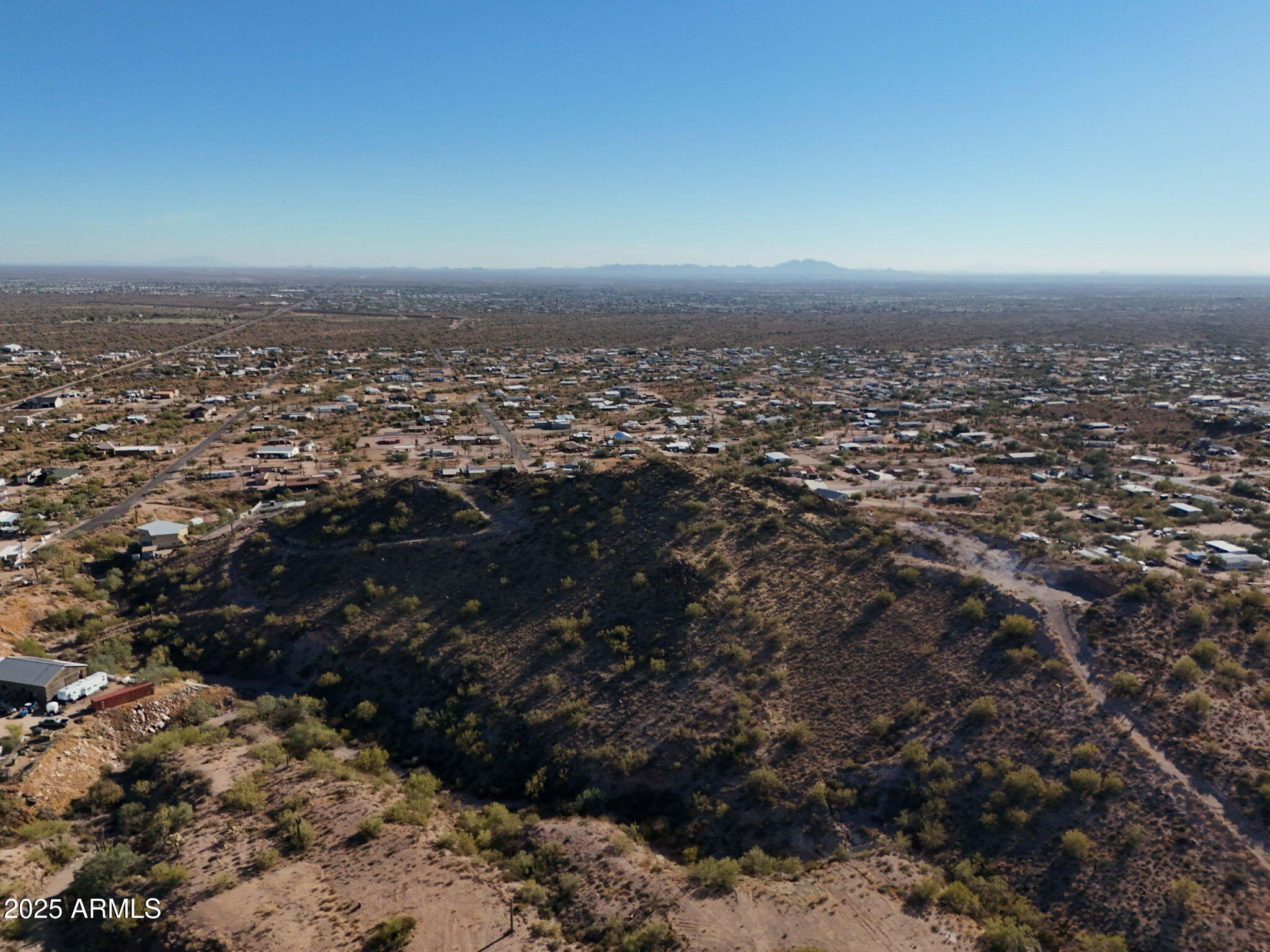 493 West McDowell Boulevard Apache Junction, AZ 85120 - Photo 18 of 29 an aerial view of a house with a city