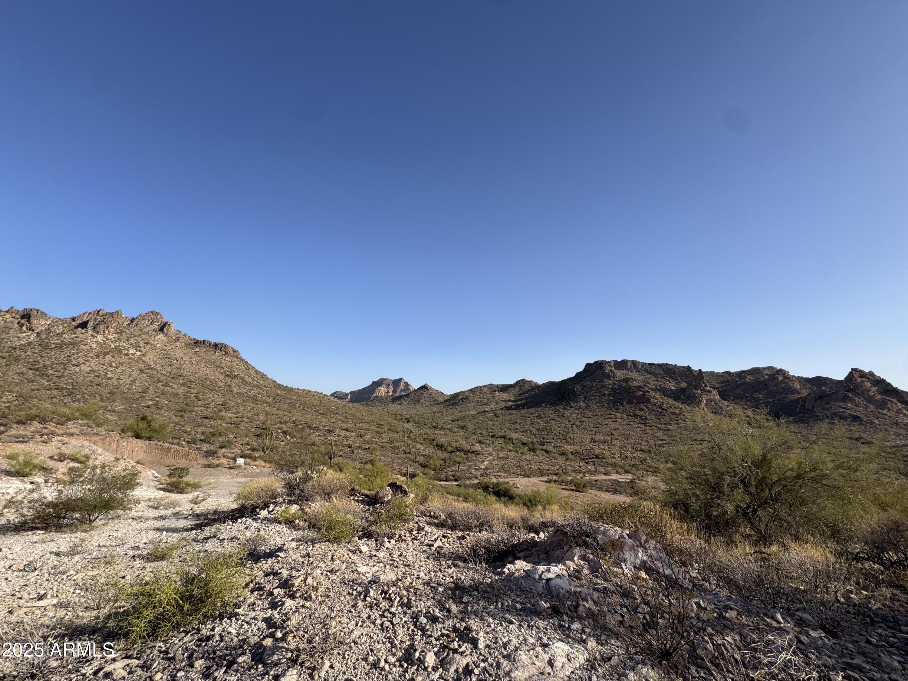 493 West McDowell Boulevard Apache Junction, AZ 85120 - Photo 5 of 29 a view of a large mountain with mountains in the background