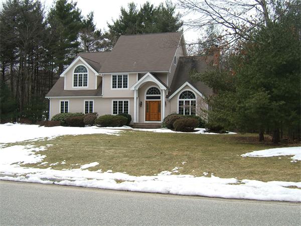 21 Lt J Cabral Drive Middleton, MA 01949 - Photo 2 of 30 a front view of a house with a yard