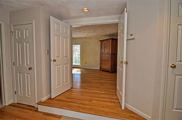 21 Lt J Cabral Drive Middleton, MA 01949 - Photo 21 of 30 a view of a hallway with wooden floor