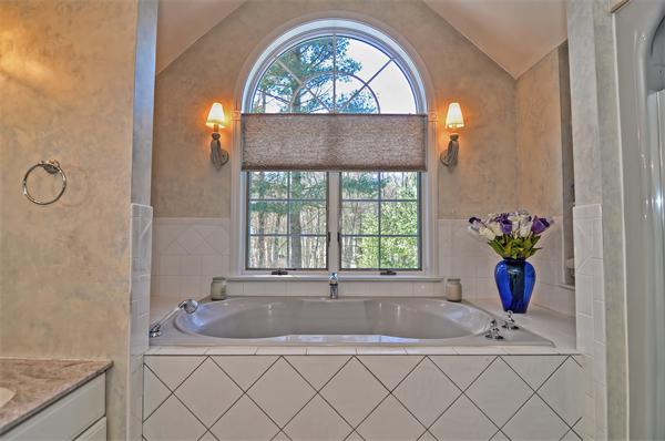 21 Lt J Cabral Drive Middleton, MA 01949 - Photo 25 of 30 a bath tub sitting next to a window