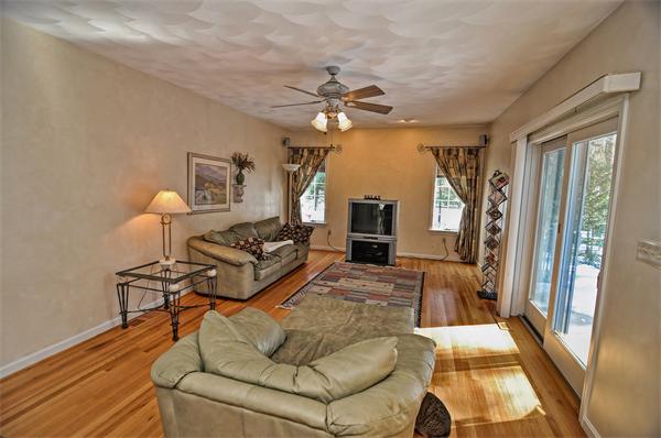 21 Lt J Cabral Drive Middleton, MA 01949 - Photo 9 of 30 a living room with furniture and a fireplace