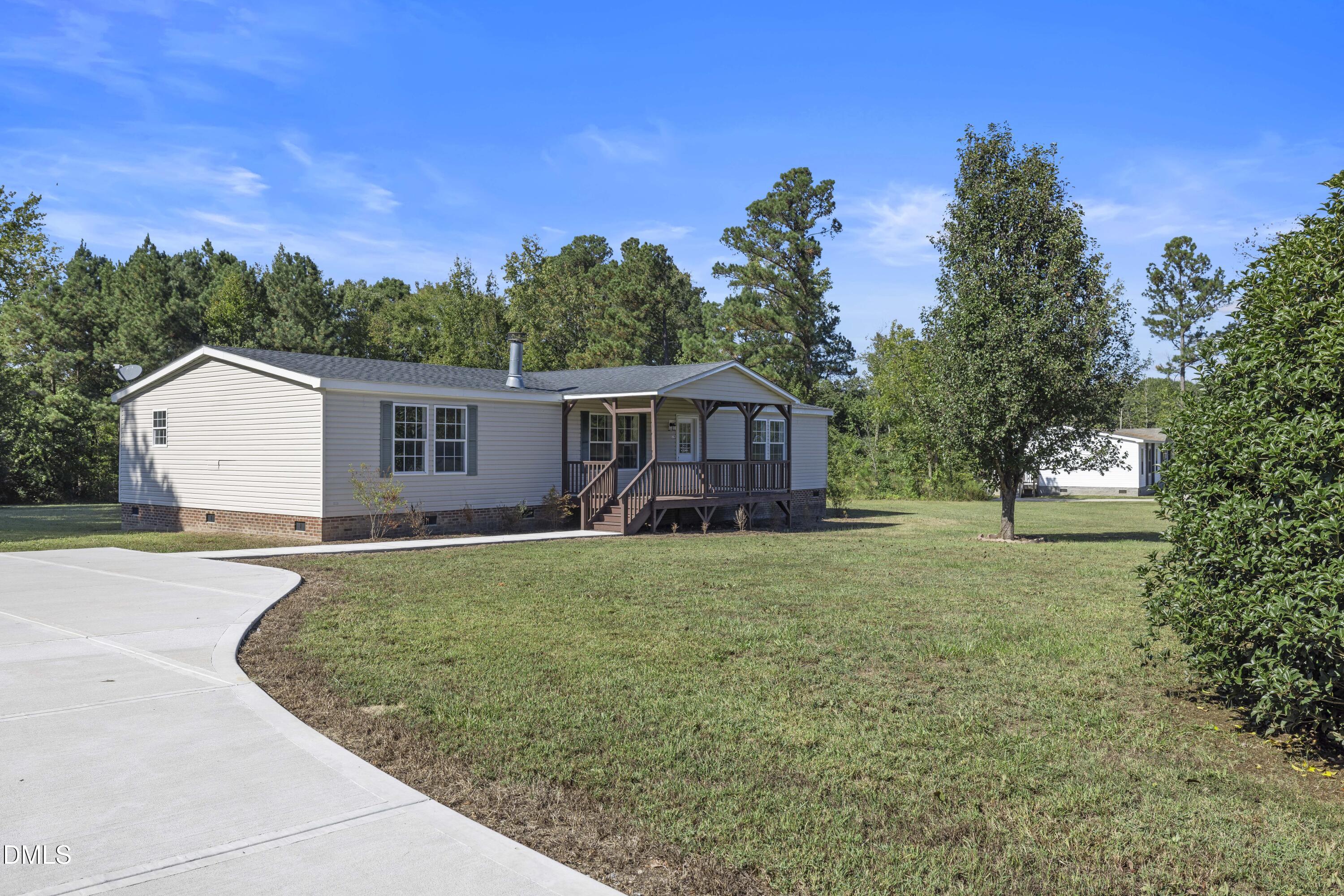 276 Floyd Road Louisburg, NC 27549 - Photo 1 of 38 Front Yard
