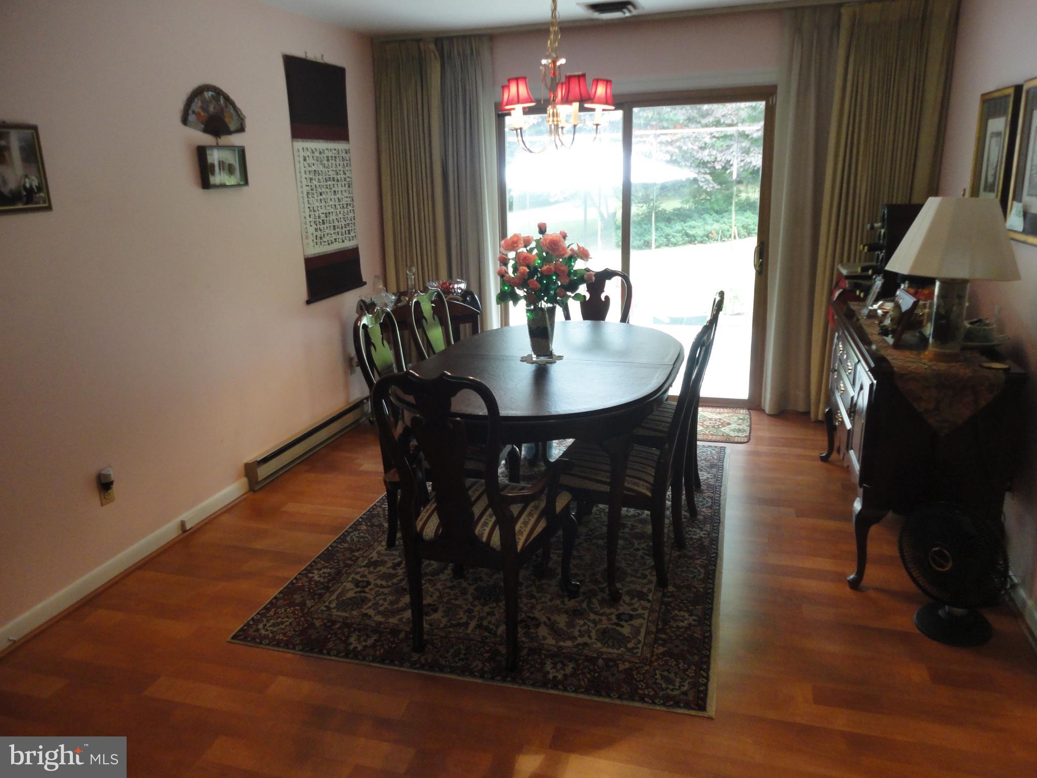 1972 Fairfax Road Annapolis, MD 21401 - Photo 10 of 30 Formal Dining Room With Sliders Opening To Patio