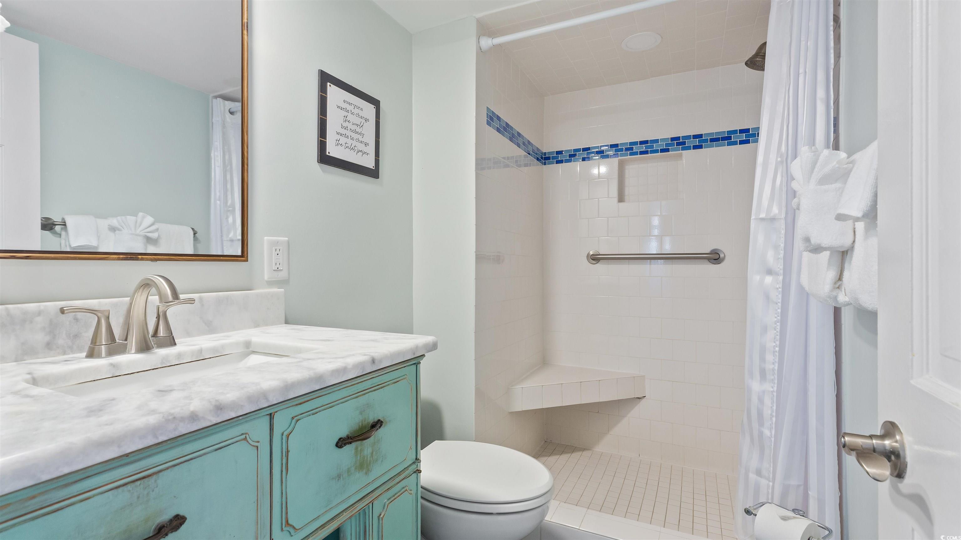 2001 South Ocean Boulevard, Unit 603 Myrtle Beach, SC 29577 - Photo 28 of 33 Bathroom featuring vanity and a shower stall