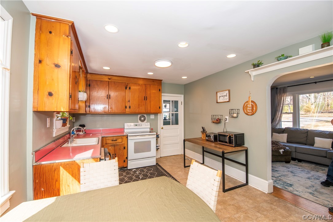 6235 Derwent Road Richmond, VA 23225 - Photo 8 of 39 Large Kitchen with access to the side Sun Porch.