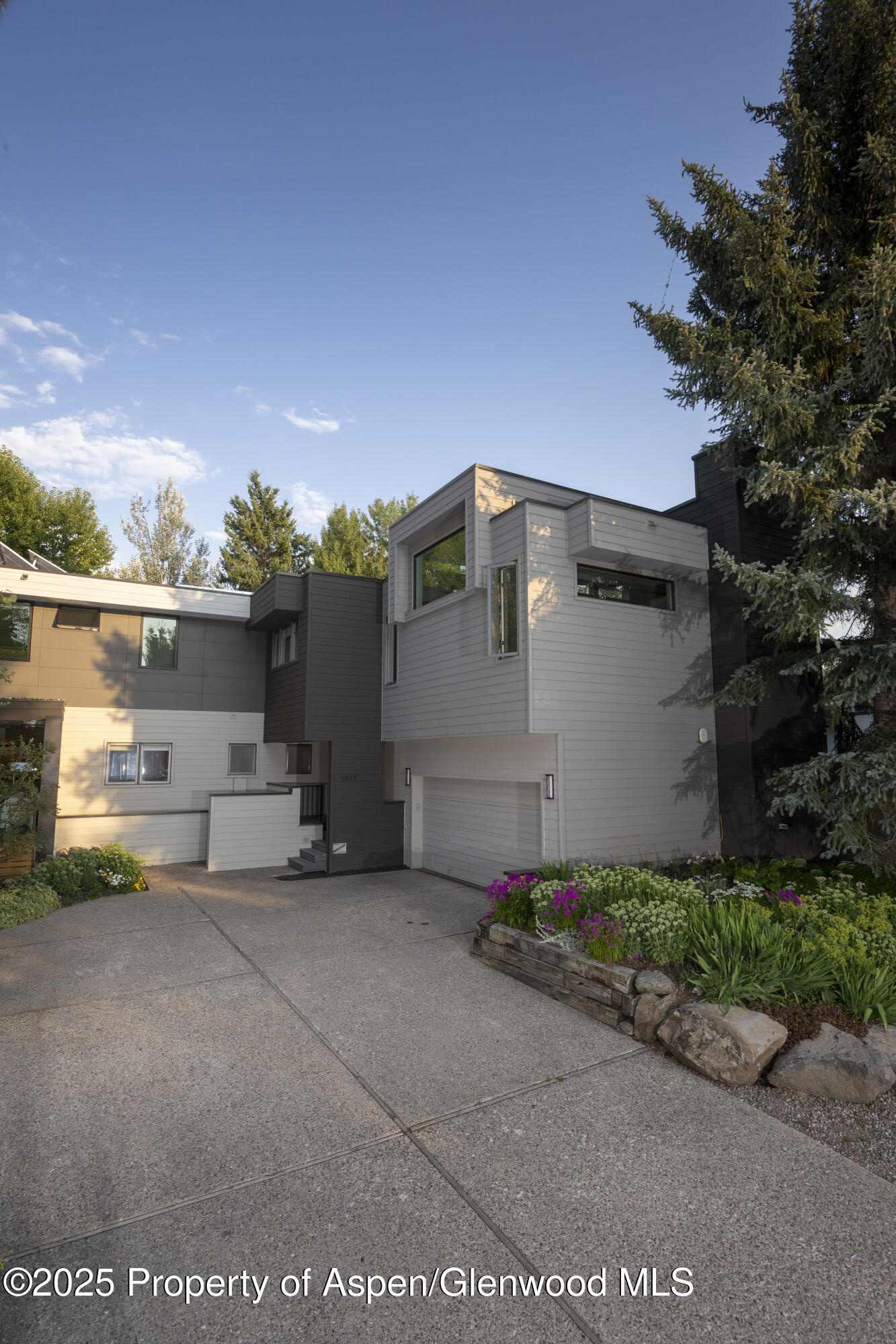1417 Sierra Vista Drive Aspen, CO 81611 - Photo 23 of 37 a view of a house with a yard and sitting area