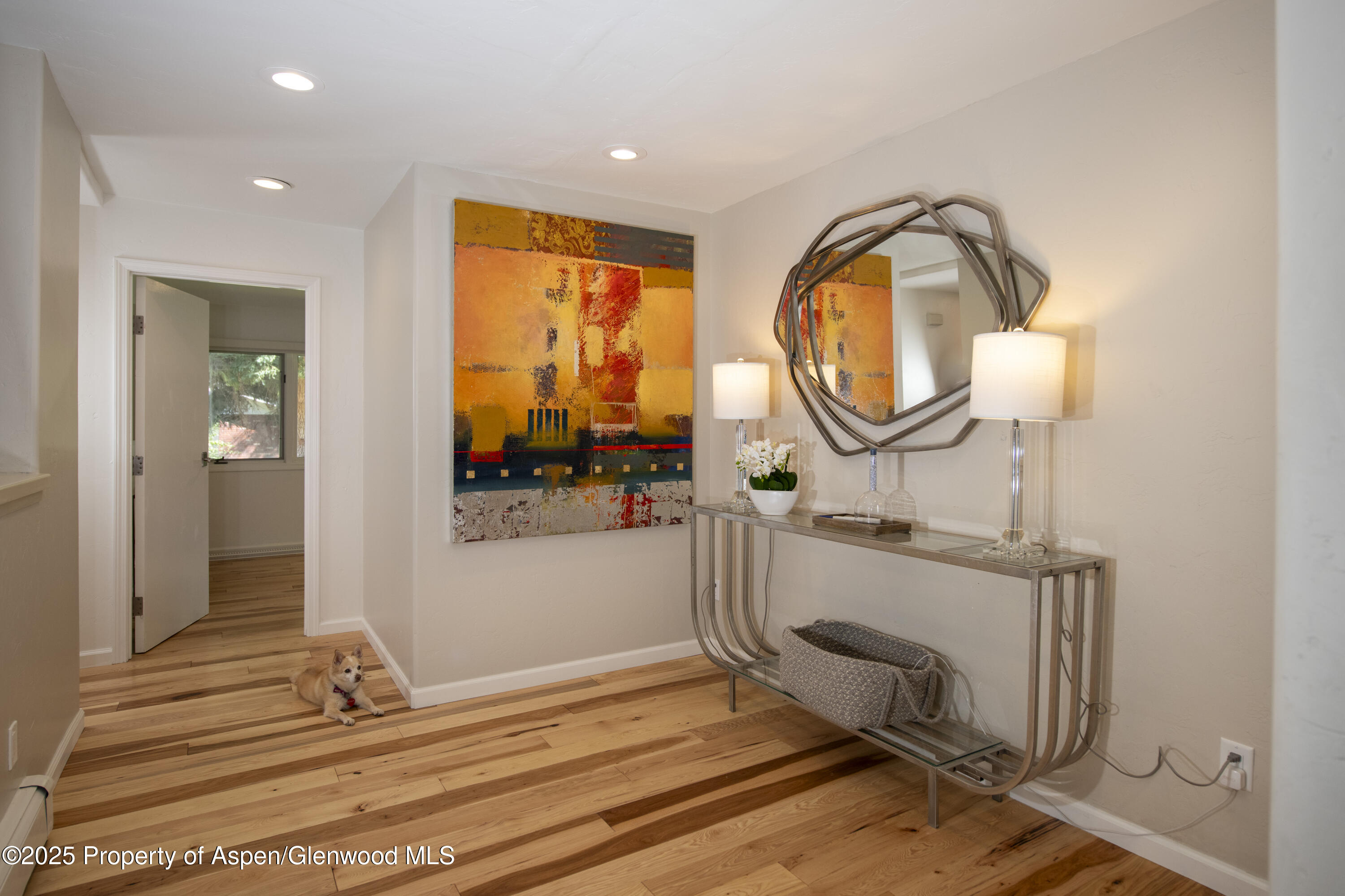 1417 Sierra Vista Drive Aspen, CO 81611 - Photo 24 of 37 a view of a room with wooden floor and white walls