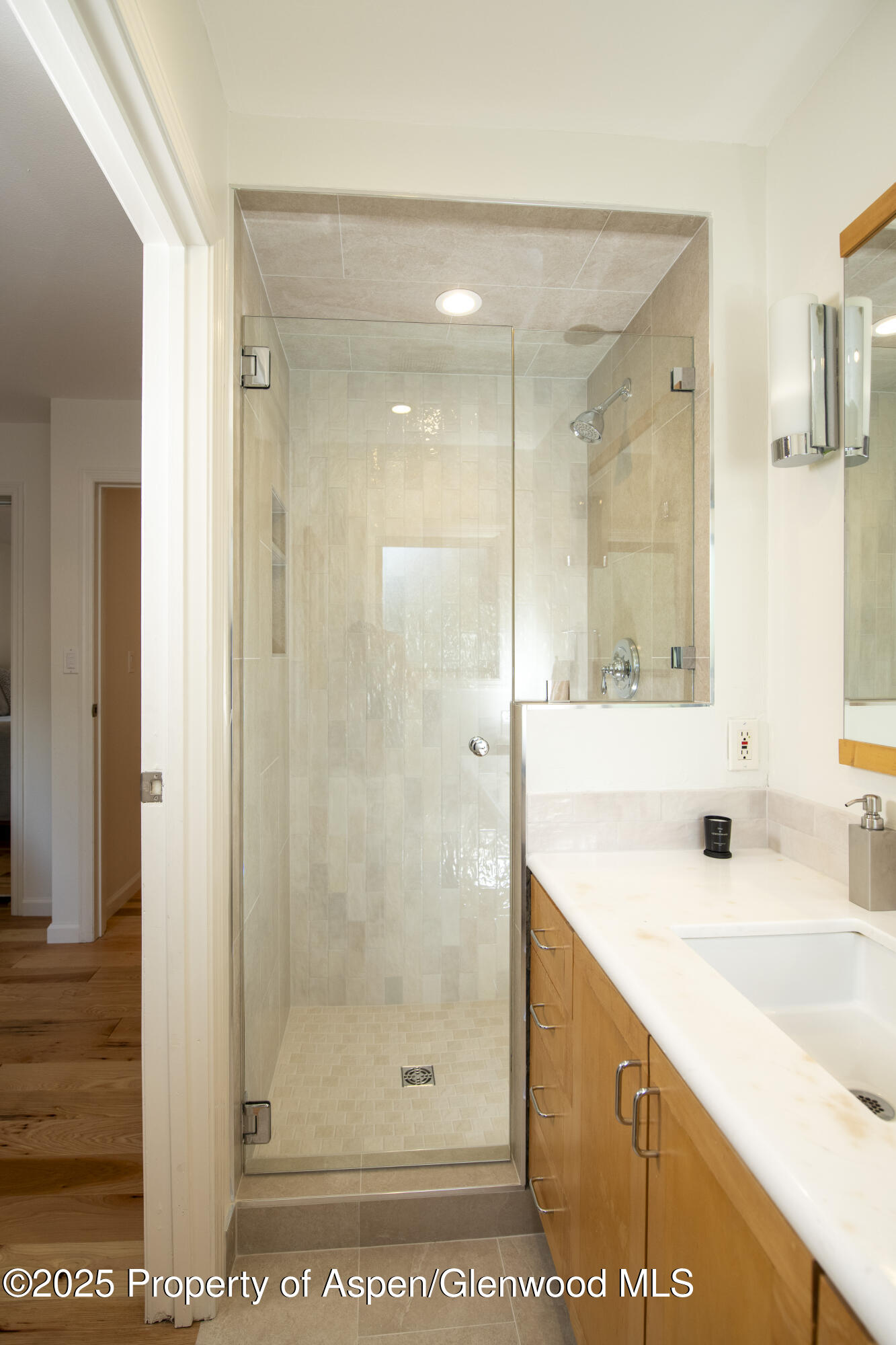 1417 Sierra Vista Drive Aspen, CO 81611 - Photo 28 of 37 a bathroom with a sink and a mirror