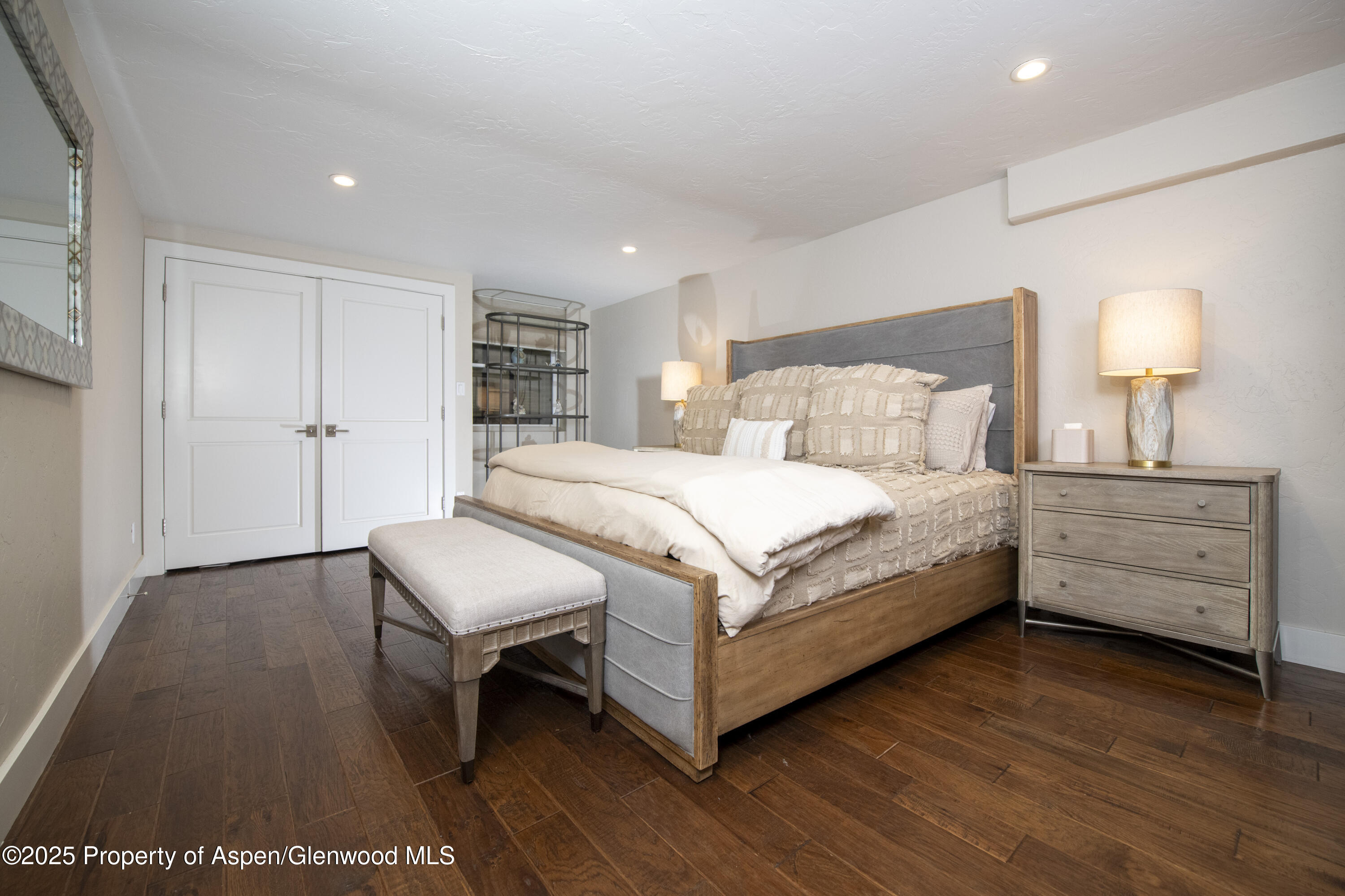 1417 Sierra Vista Drive Aspen, CO 81611 - Photo 29 of 37 a bedroom with a bed and a night stand