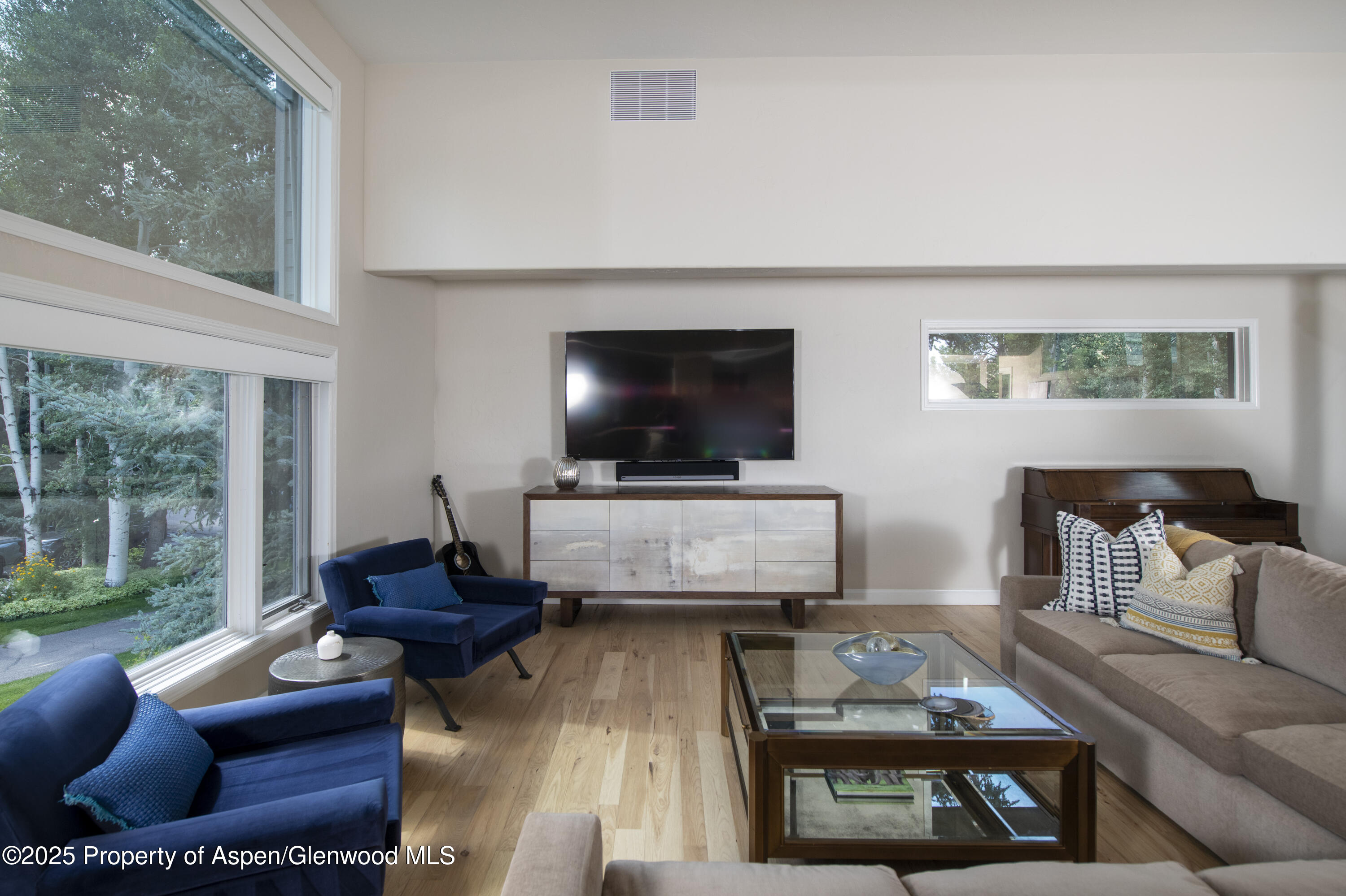 1417 Sierra Vista Drive Aspen, CO 81611 - Photo 5 of 37 a living room with furniture and a flat screen tv
