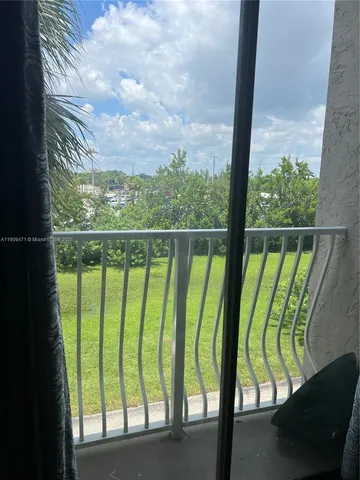 a view of outdoor space with seating area