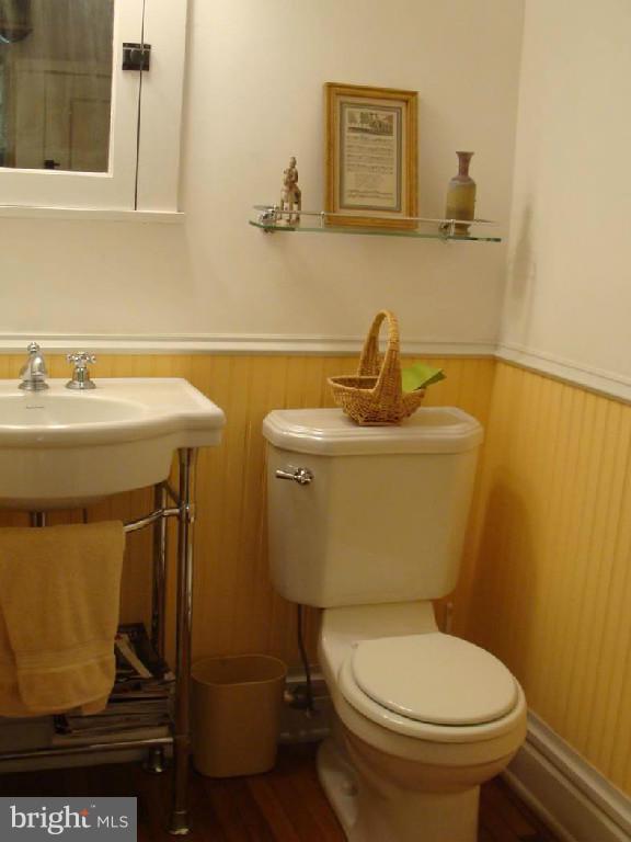 5717 Uffington Road Baltimore, MD 21209 - Photo 17 of 19 a bathroom with a sink and a toilet