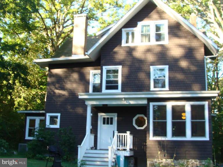 5717 Uffington Road Baltimore, MD 21209 - Photo 18 of 19 a front view of a house with a yard