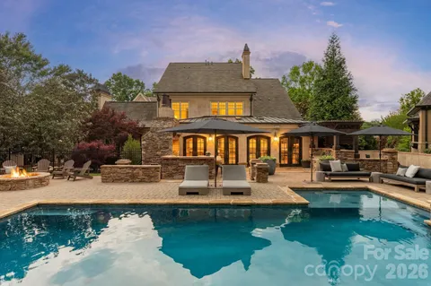 a front view of a house with swimming pool