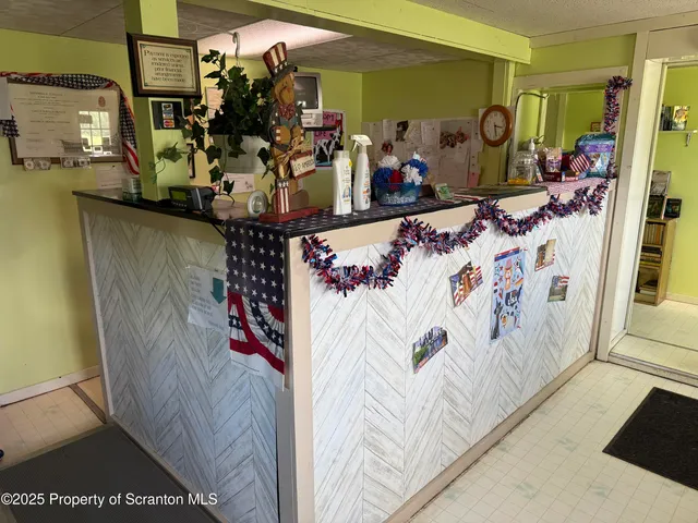 a view of a living room with clothes