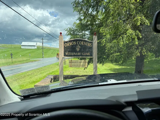 a view of a back yard of the house