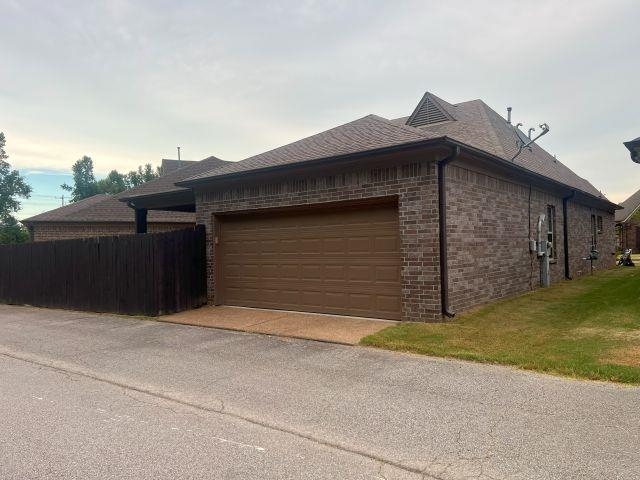 1977 Rochelle Lane Cordova, TN 38016 - Photo 19 of 26 a front view of a house with a garage