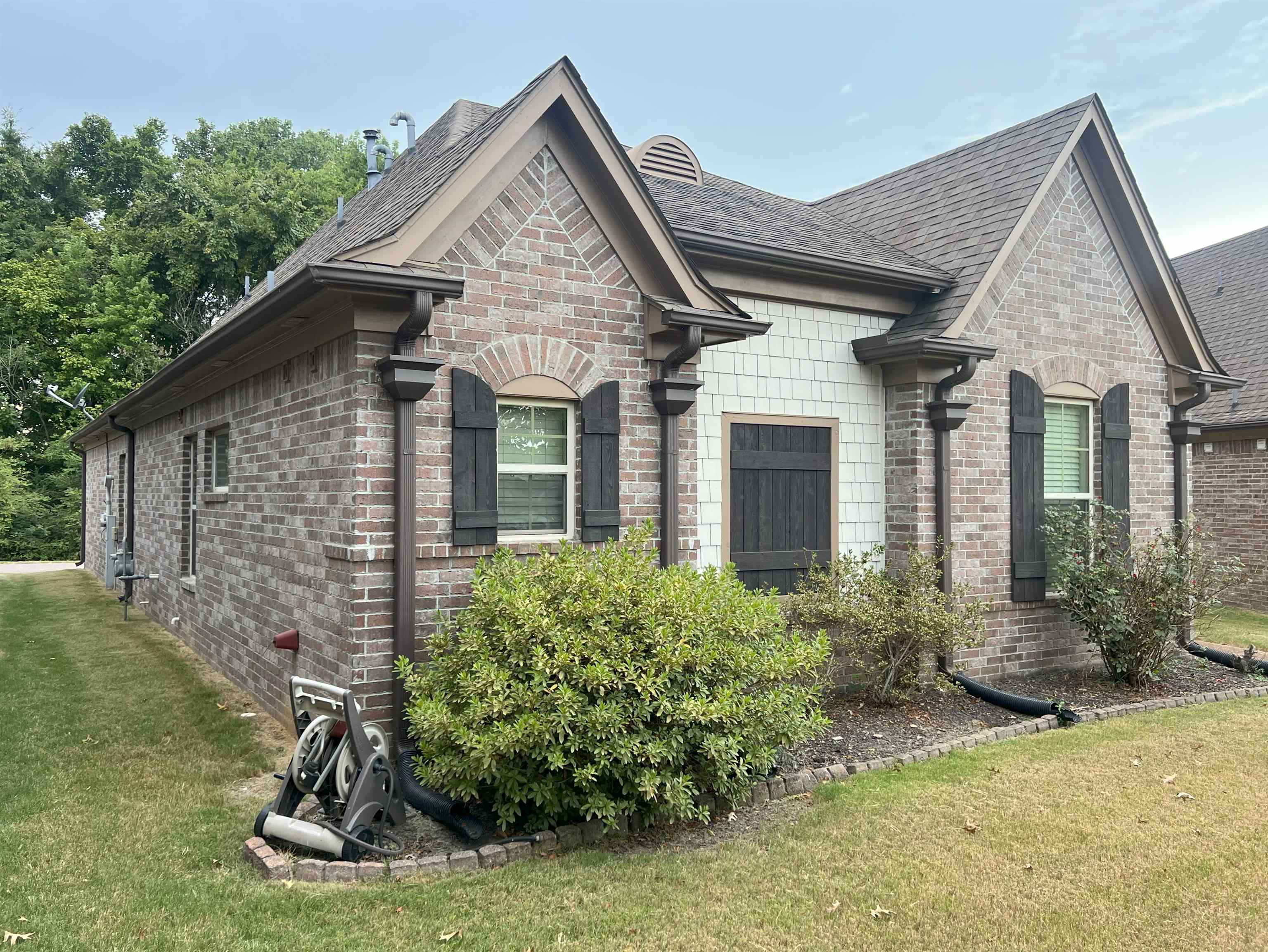 1977 Rochelle Lane Cordova, TN 38016 - Photo 22 of 26 a front view of a house with a yard