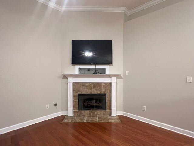 1977 Rochelle Lane Cordova, TN 38016 - Photo 3 of 26 a living room with a fireplace and a flat screen tv