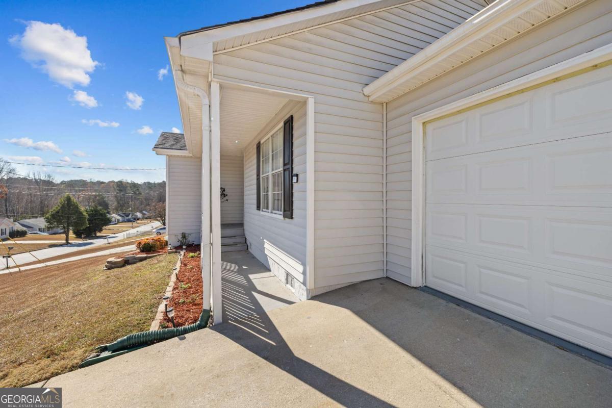6324 Amberly Road Rex, GA 30273 - Photo 2 of 22 a view of a terrace with sky view