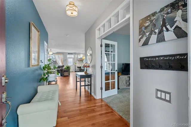 a living room with furniture and a table