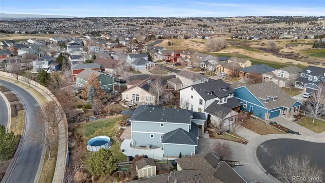 an aerial view of a house with a outdoor space