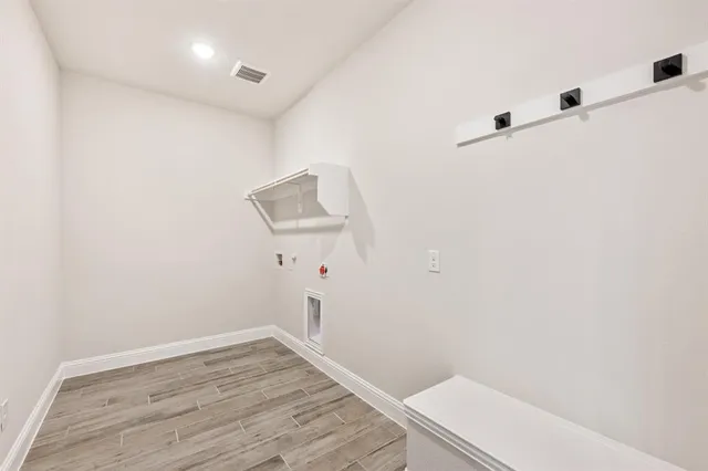 a view of small space with wooden floor