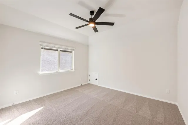 a view of front door of house and yard