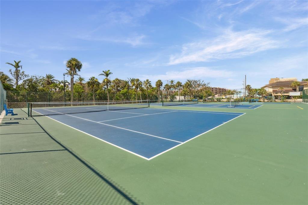 6415 Midnight Pass Road, Unit 211 Sarasota, FL 34242 - Photo 44 of 58 a view of a tennis court