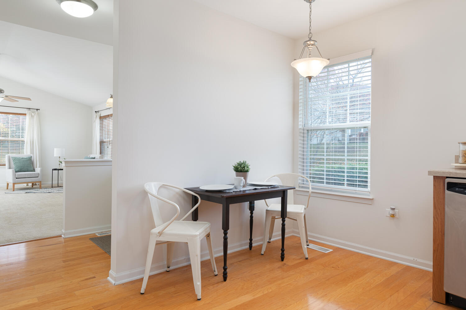 31 Rolling Oaks Road, Unit A Sugar Grove, IL 60554 - Photo 13 of 25 a view of a dining room with furniture and wooden floor
