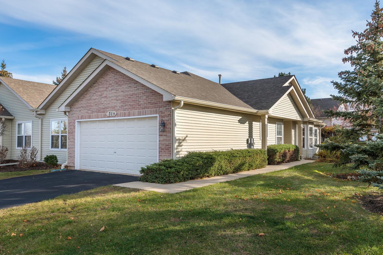 31 Rolling Oaks Road, Unit A Sugar Grove, IL 60554 - Photo 3 of 25 a view of a house with a yard