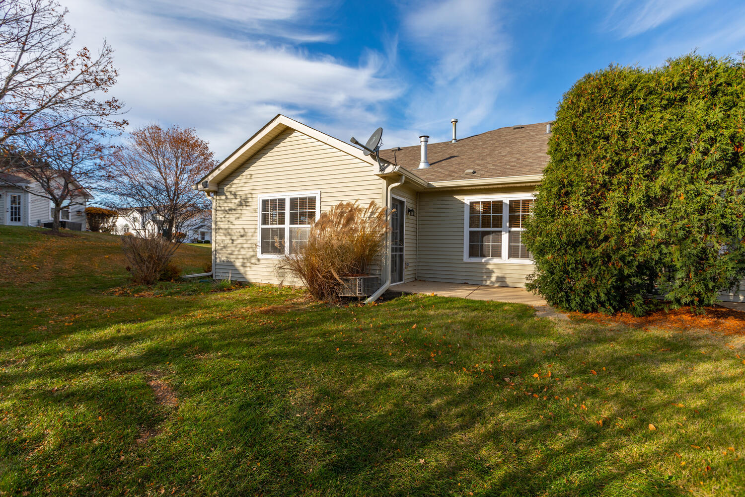 31 Rolling Oaks Road, Unit A Sugar Grove, IL 60554 - Photo 24 of 25 a view of a house with a yard