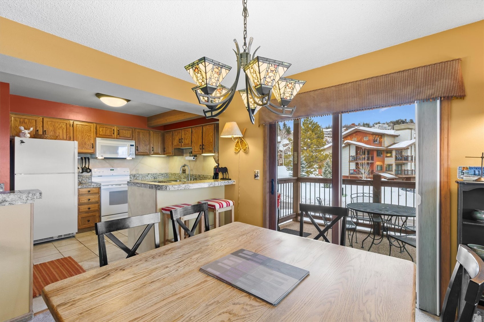 1655 Ranch Road, Unit 402 Steamboat Springs, CO 80487 - Photo 10 of 30 Convenient Spacing Between Kitchen and Dining