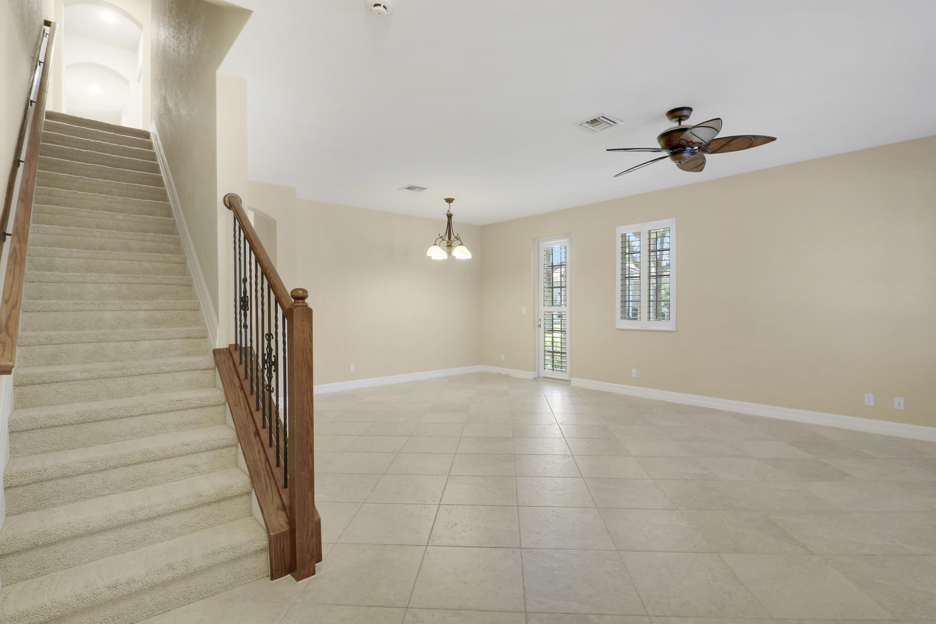 138 Tallow Trail Jupiter, FL 33458 - Photo 15 of 38 a view of an empty room with a window