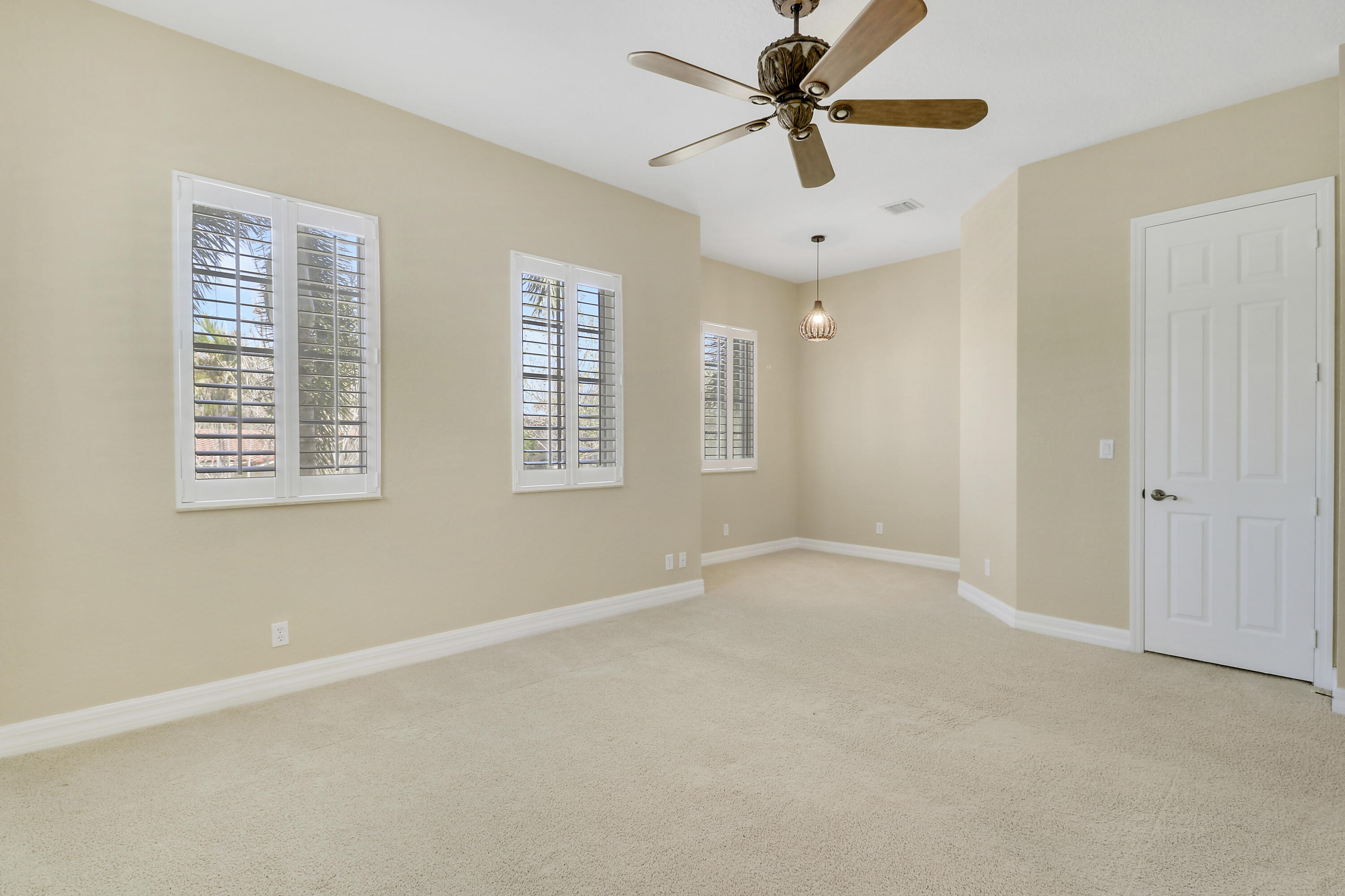 138 Tallow Trail Jupiter, FL 33458 - Photo 19 of 38 a view of an empty room with a window