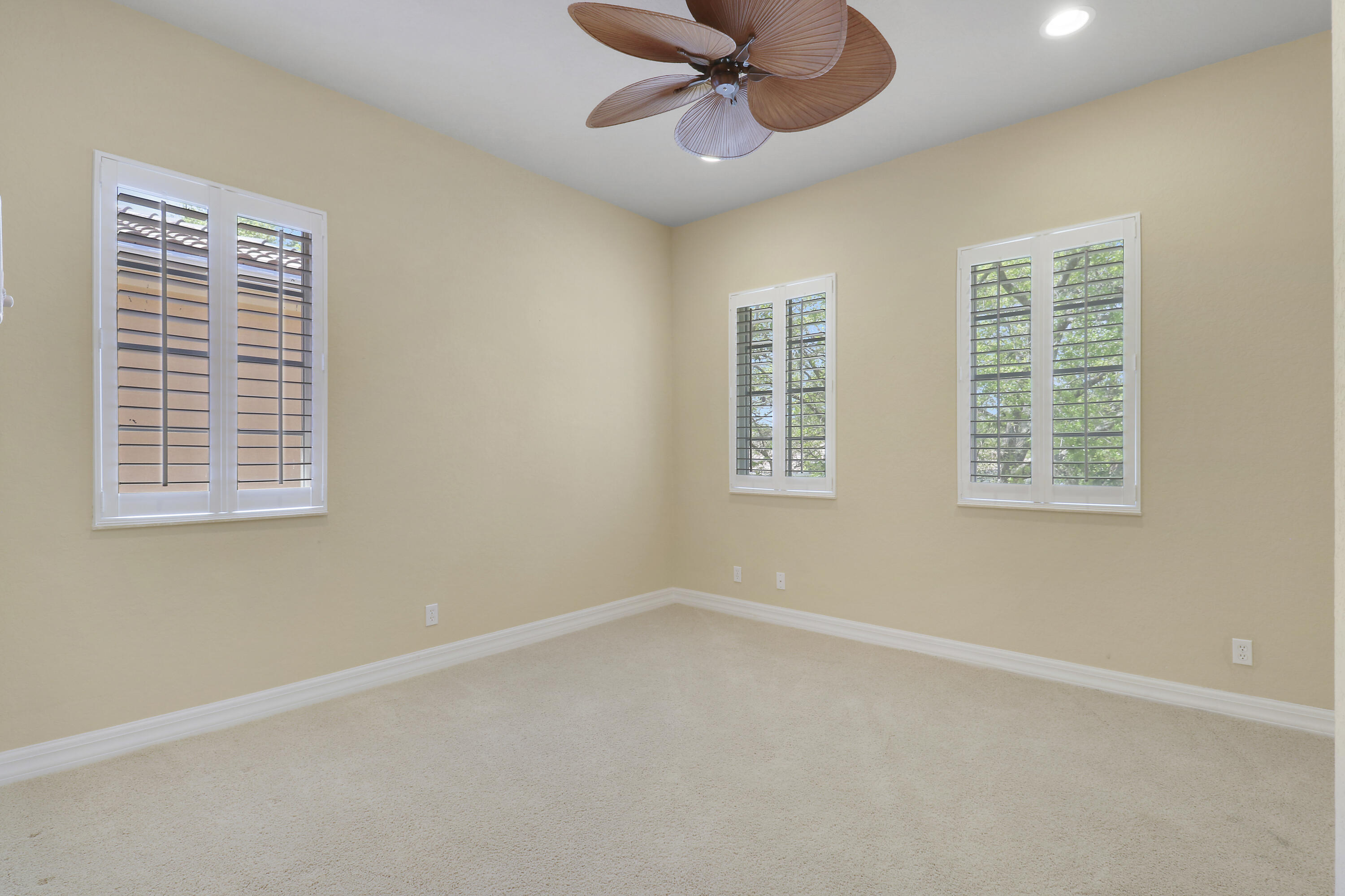 138 Tallow Trail Jupiter, FL 33458 - Photo 24 of 38 a view of an empty room with a window