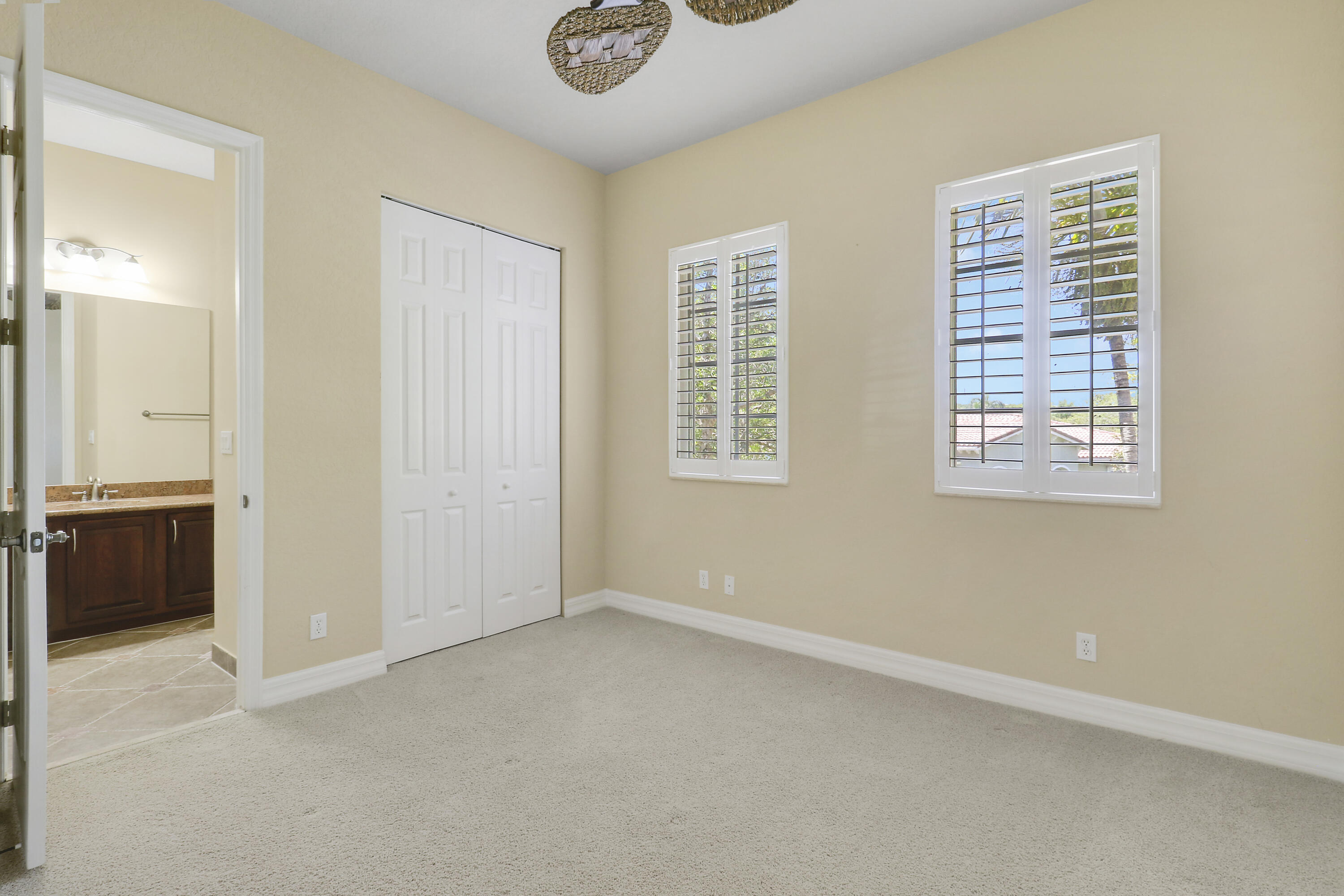 138 Tallow Trail Jupiter, FL 33458 - Photo 25 of 38 an empty room with windows