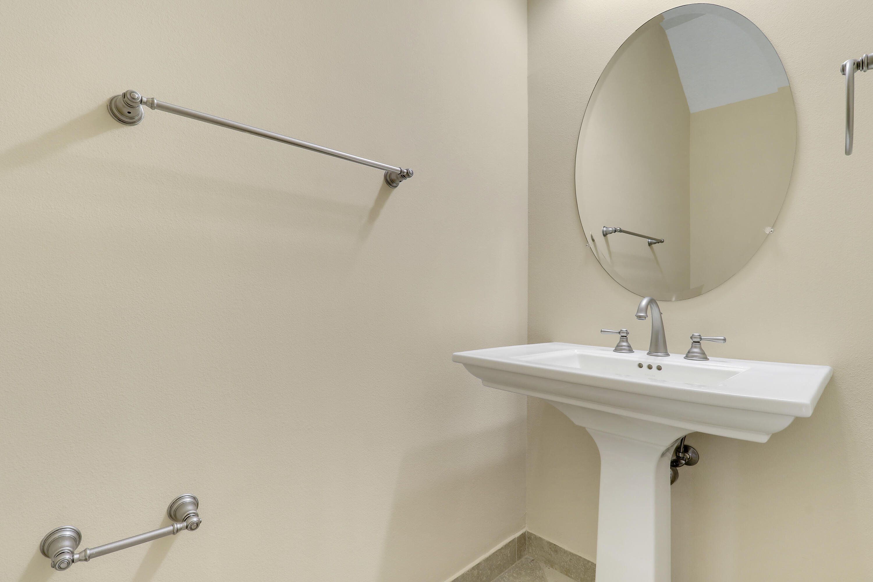 138 Tallow Trail Jupiter, FL 33458 - Photo 29 of 38 a bathroom with a sink and mirror