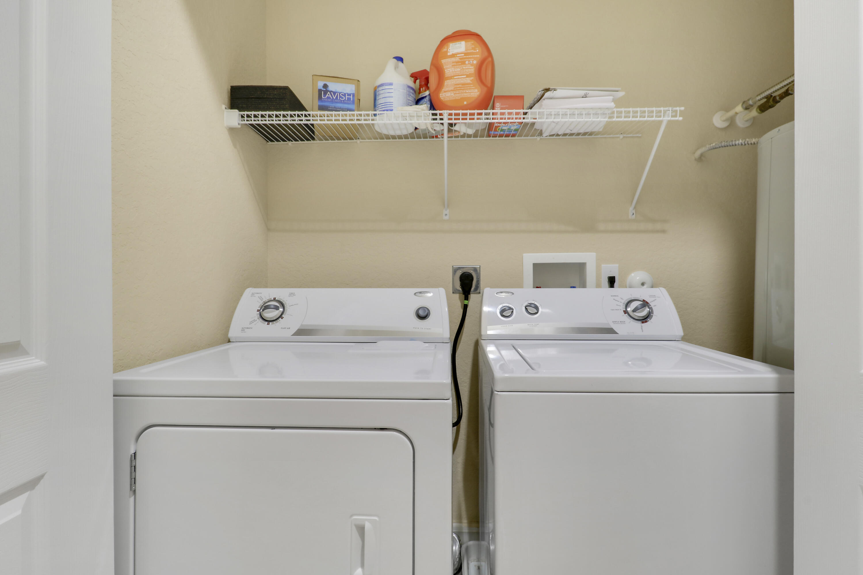 138 Tallow Trail Jupiter, FL 33458 - Photo 30 of 38 a utility room with dryer and washer