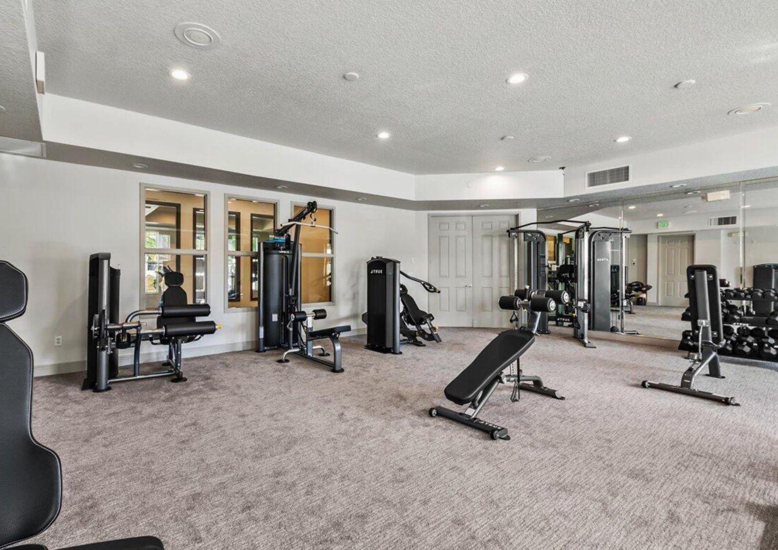 138 Tallow Trail Jupiter, FL 33458 - Photo 37 of 38 a view of a room with gym equipment