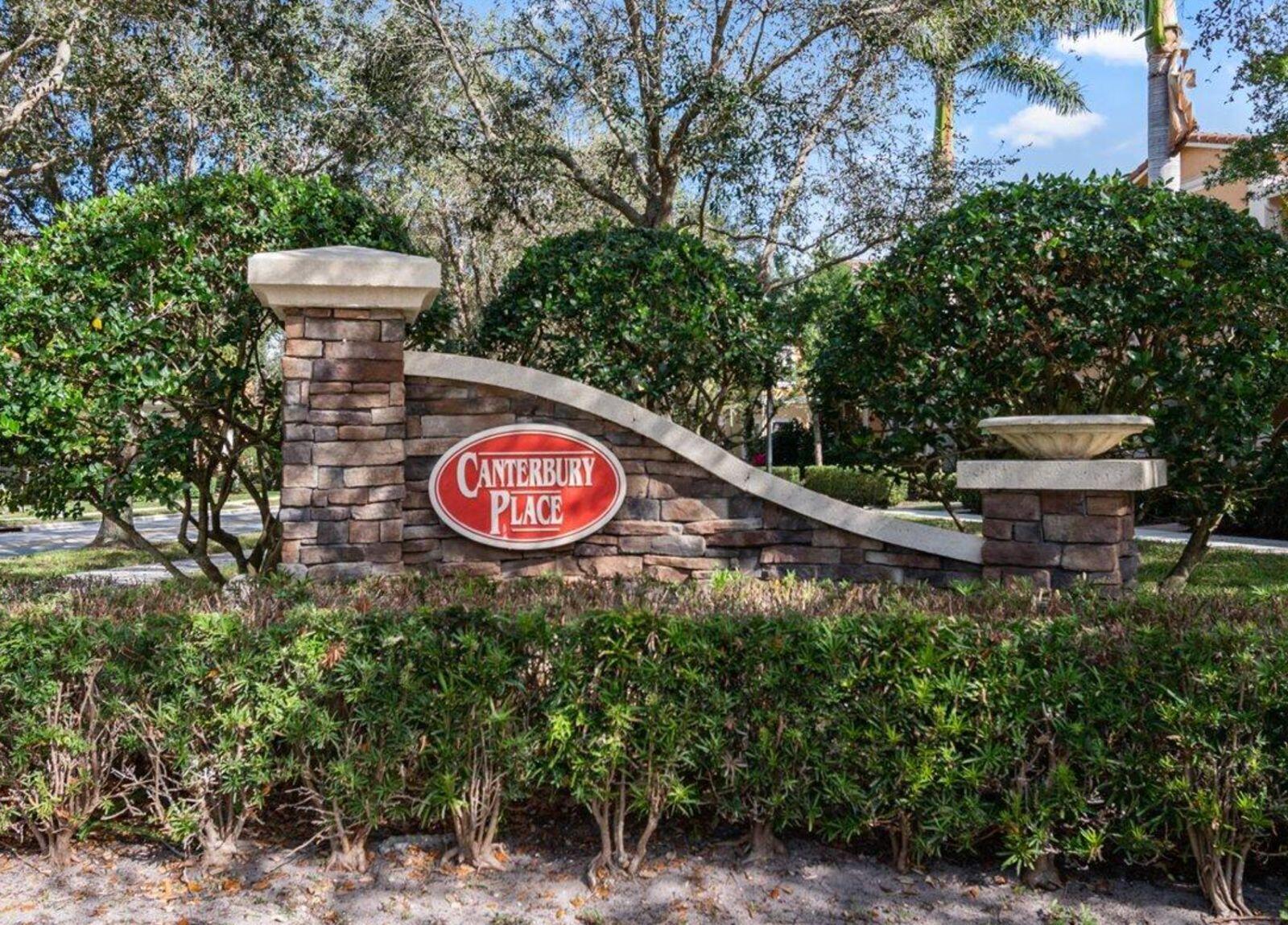 138 Tallow Trail Jupiter, FL 33458 - Photo 38 of 38 a view of a outdoor space with signage and flags
