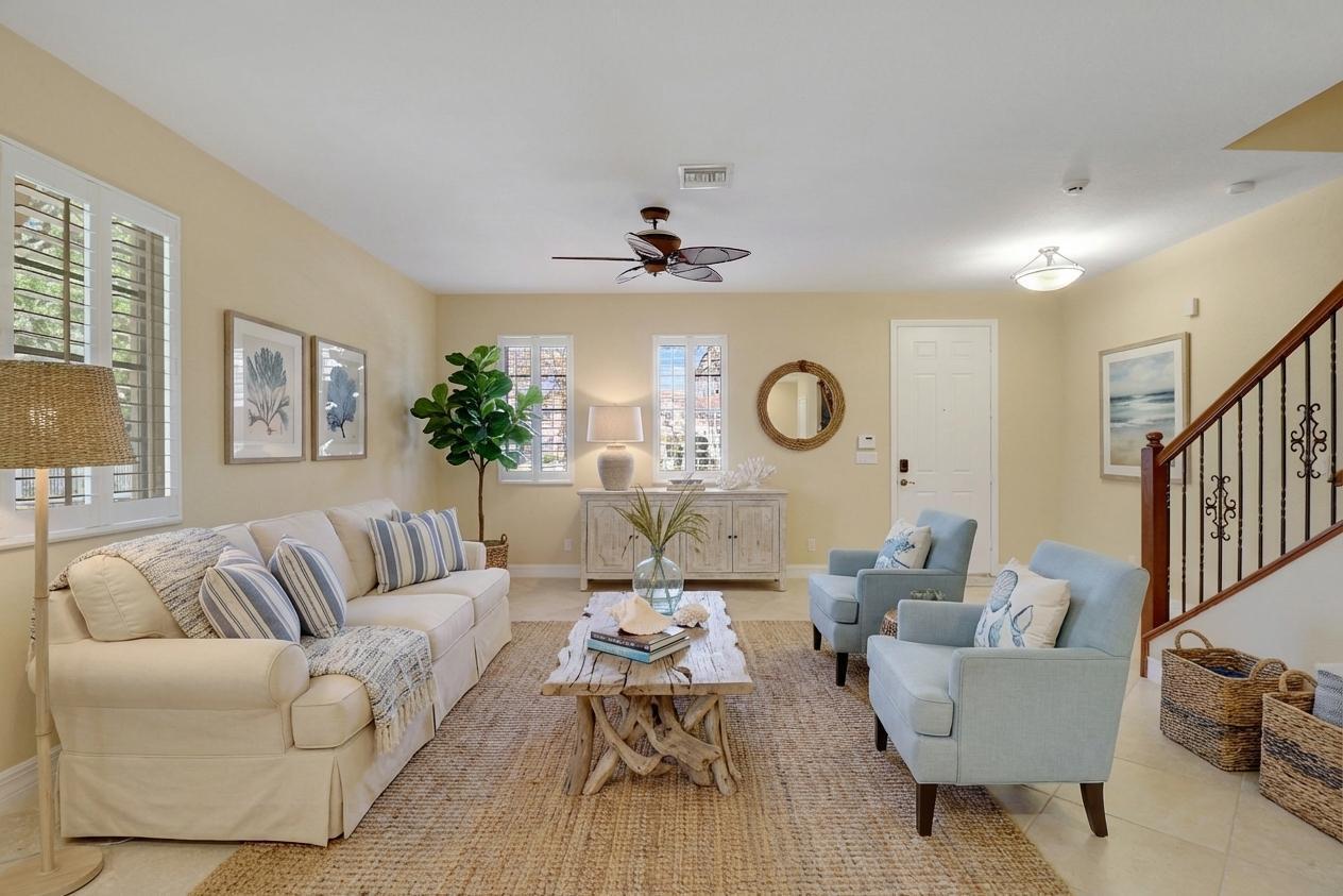 138 Tallow Trail Jupiter, FL 33458 - Photo 4 of 38 a living room with furniture and a large window