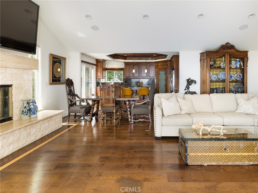 8 Stallion Road Rancho Palos Verdes, CA 90275 - Photo 13 of 56 a living room with fireplace furniture and a flat screen tv