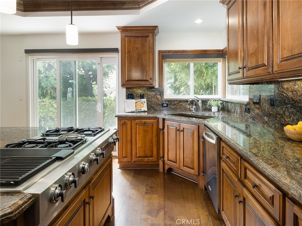 8 Stallion Road Rancho Palos Verdes, CA 90275 - Photo 20 of 56 a kitchen with a stove a sink and a window